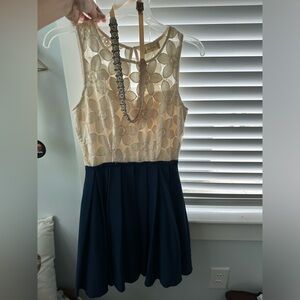 Altar’d State dress size XS. never wore. is a creme and blue color.